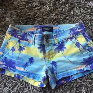 American Eagle sunset palm tree shorts